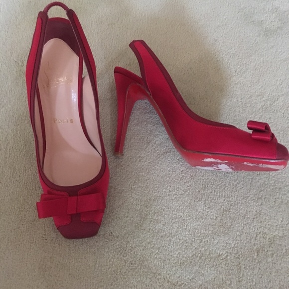 Red satin Louboutin bow-tie stilettos. - Picture 2 of 6